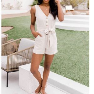 Small cream button down tie waist romper